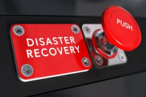 An image of a red button to push to initiate the disaster recovery plan.