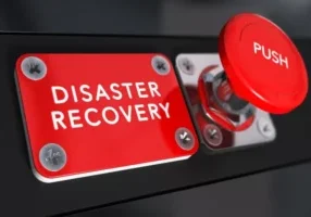 An image of a red button to push to initiate the disaster recovery plan.